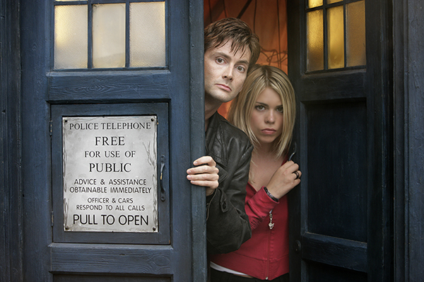 Doctor Who (David Tennant) with Rose Tyler (Billie Piper) looking out from the Tardis