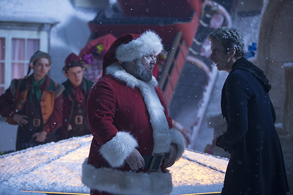 Santa (Nick Frost) with The Doctor (Peter Capaldi) on a snowy rooftop