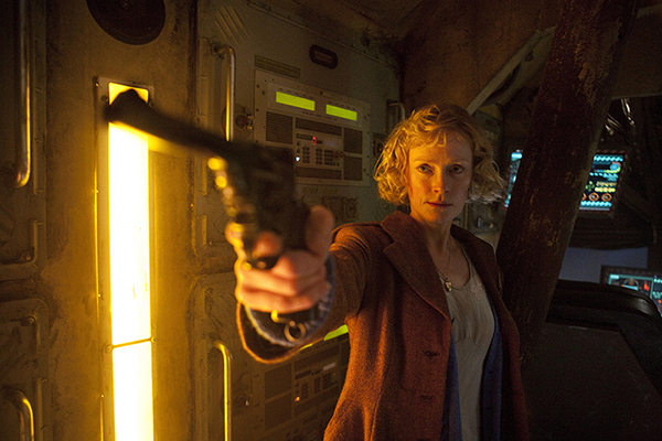 Madge Arwell (Claire Skinner) branishes a pistol from Doctor Who episode The Doctor The Widow And The Wardrobe