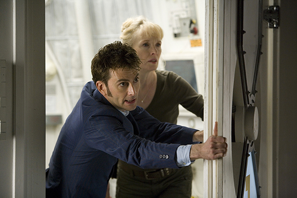The Dr (David Tennant) and Adelaide Brooke (Lindsay Duncan) close watertight door to escape